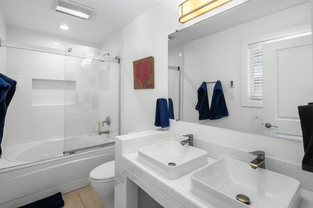 2090 Chalet Road, Unit 4 Alpine Meadows, CA 96146 - Photo 13 of 28 a bathroom with a sink toilet and shower