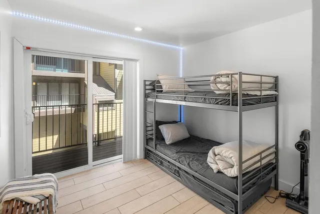 a bathroom with a tub and a sink