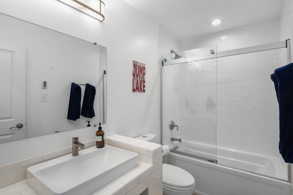 2090 Chalet Road, Unit 4 Alpine Meadows, CA 96146 - Photo 17 of 28 a bathroom with a sink toilet and shower