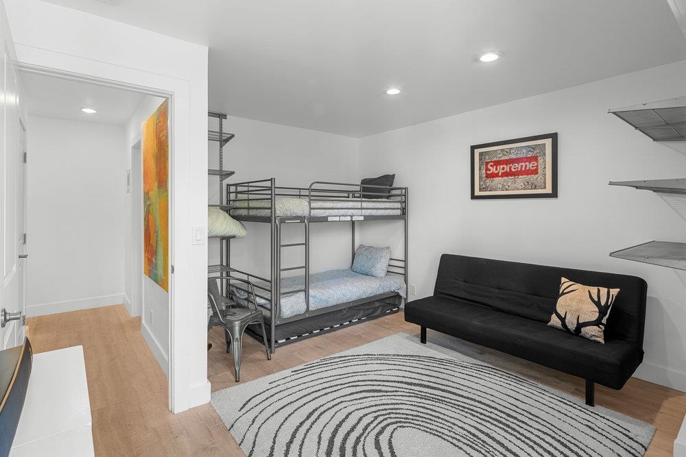 2090 Chalet Road, Unit 4 Alpine Meadows, CA 96146 - Photo 19 of 28 a bedroom with furniture and a rug