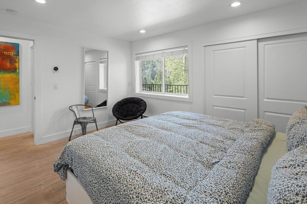 2090 Chalet Road, Unit 4 Alpine Meadows, CA 96146 - Photo 21 of 28 a bedroom with a bed and a window