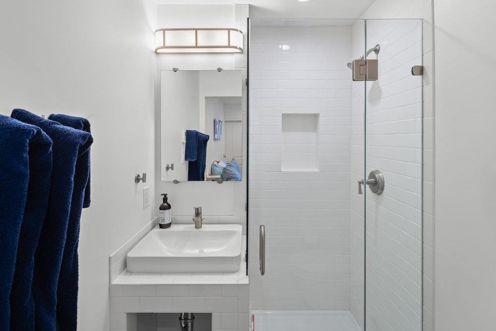 2090 Chalet Road, Unit 4 Alpine Meadows, CA 96146 - Photo 22 of 28 a bathroom with a sink and mirror