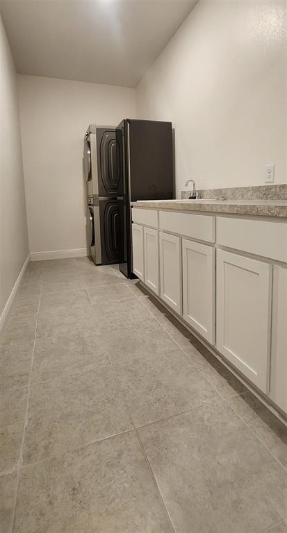 13795 Southwest 137th Way Newberry, FL 32669 - Photo 11 of 26 a view of a kitchen with refrigerator and microwave
