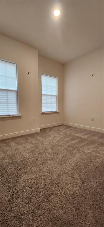 13795 Southwest 137th Way Newberry, FL 32669 - Photo 12 of 26 an empty room with a window