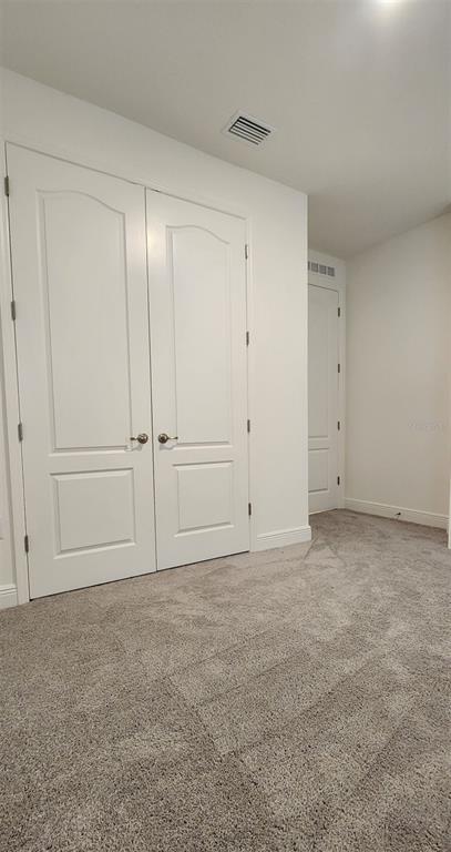 13795 Southwest 137th Way Newberry, FL 32669 - Photo 13 of 26 a view of an empty room