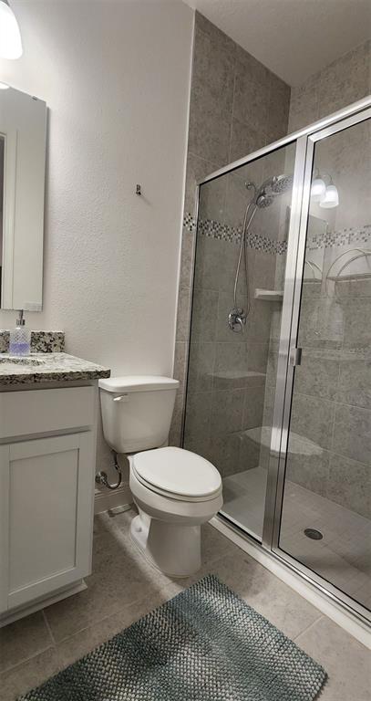 13795 Southwest 137th Way Newberry, FL 32669 - Photo 16 of 26 a bathroom with a sink toilet and shower