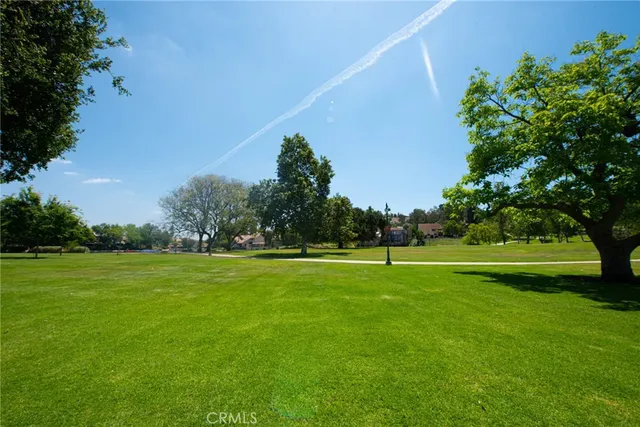 a view of swimming pool with a yard