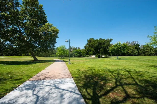 a view of a lake with a house in the background