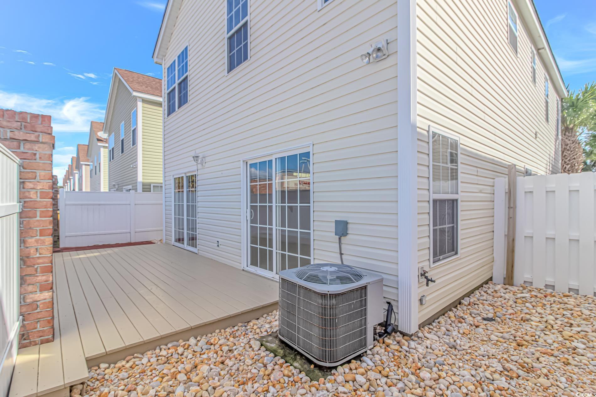 502 Lake Shore Drive Surfside Beach, SC 29575 - Photo 22 of 25 Wooden terrace featuring a fenced backyard