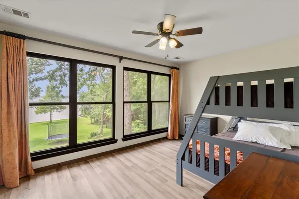 a view of a livingroom with furniture and wooden floor