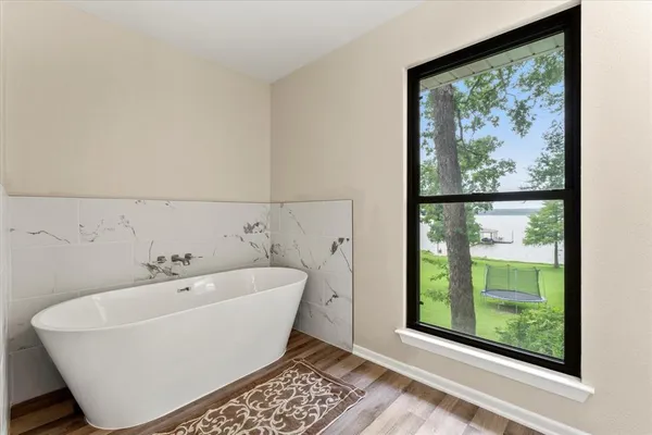 a bathroom with a double vanity sink and mirror