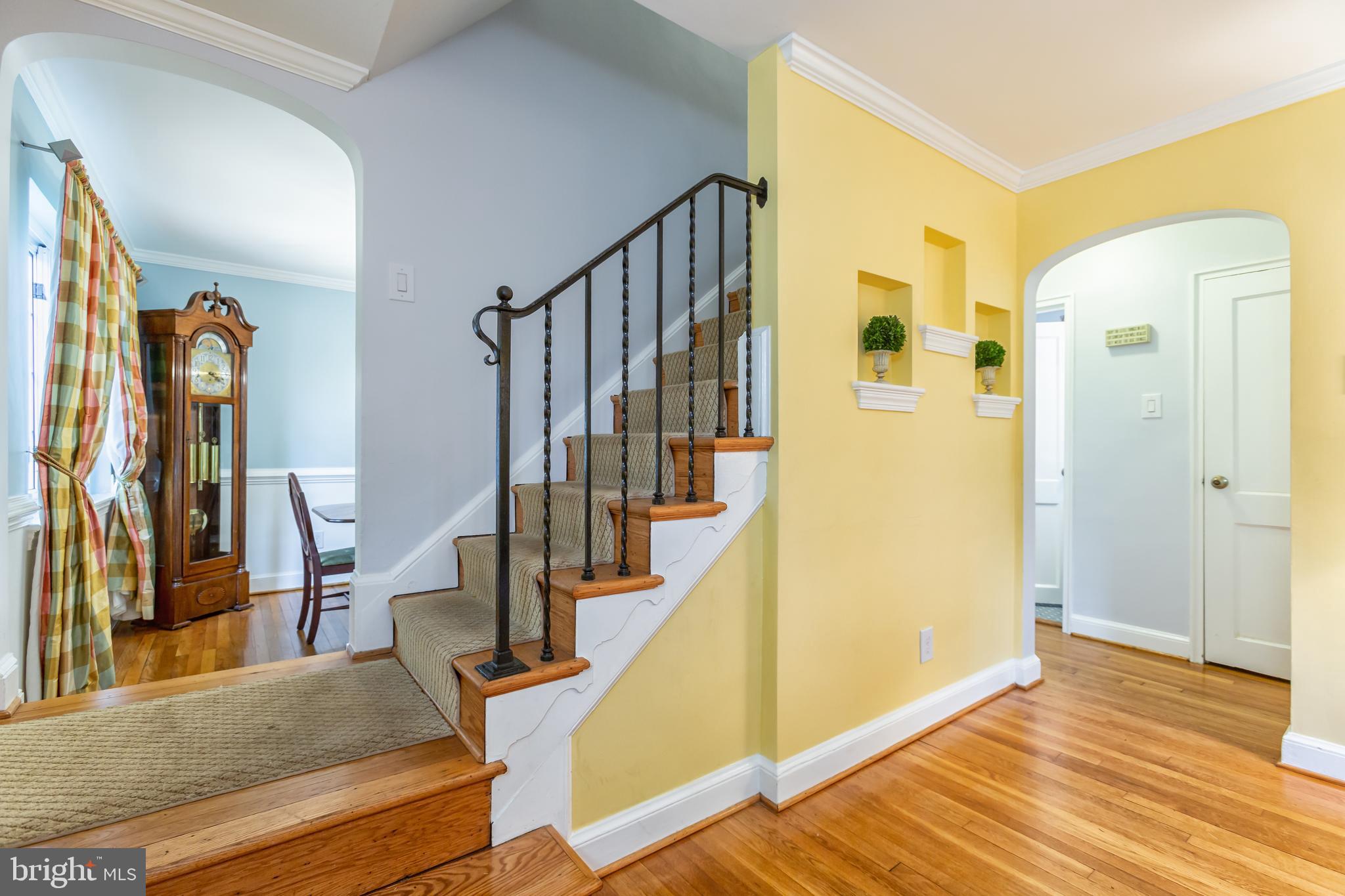 Architectural details include arched doorways