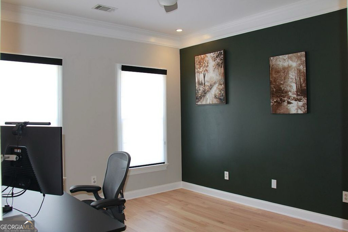 996 Pitts Road, Unit D Sandy Springs, GA 30350 - Photo 25 of 39 a view of a workspace with furniture and a window