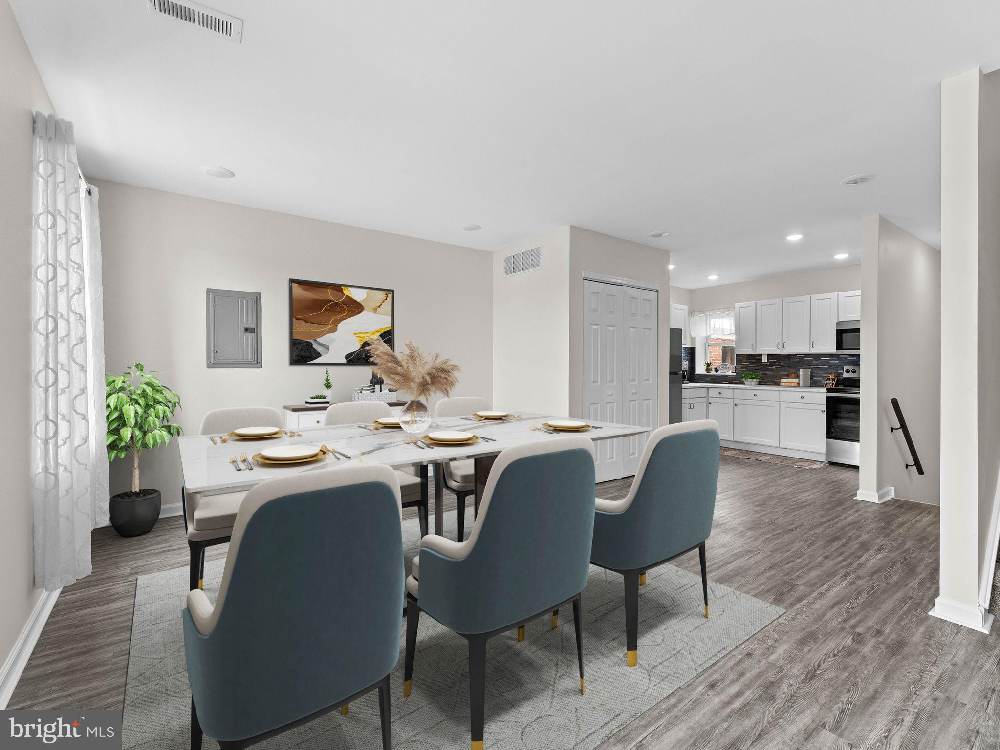 1923 North 20th Street, Unit 2 Philadelphia, PA 19121 - Photo 21 of 50 a view of a dining room with furniture and wooden floor