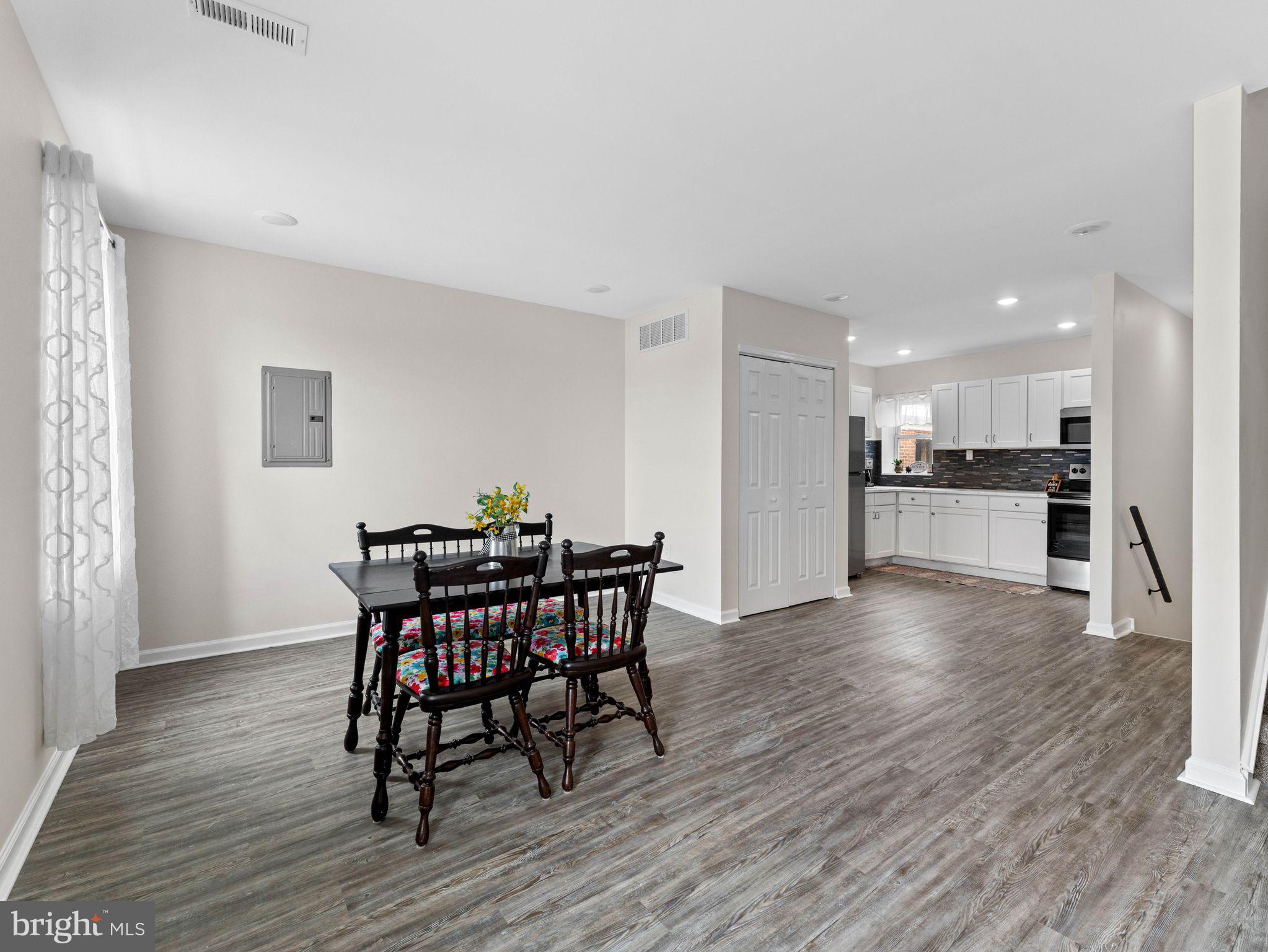 1923 North 20th Street, Unit 2 Philadelphia, PA 19121 - Photo 22 of 50 a view of a dining room with furniture and wooden floor