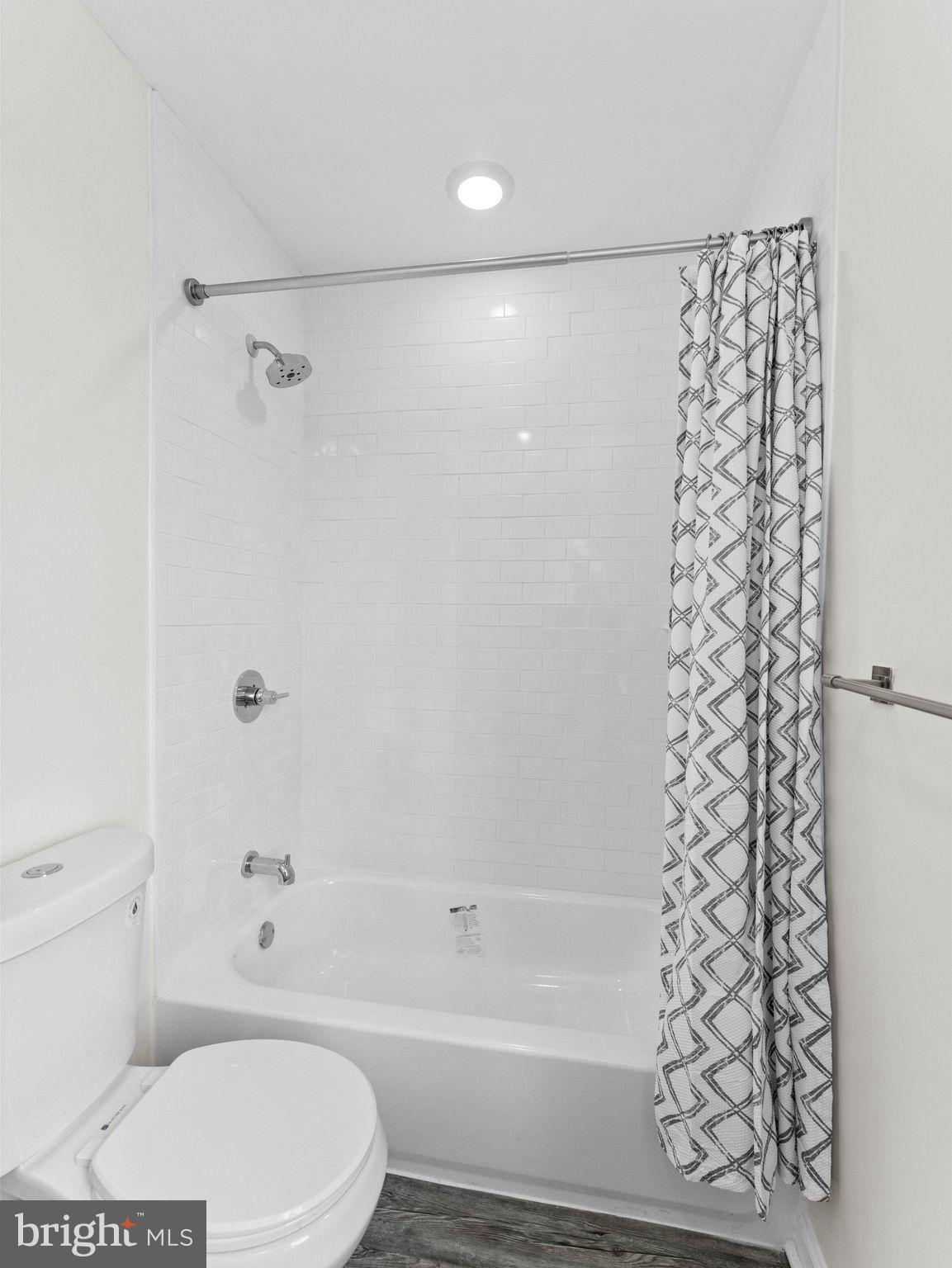 1923 North 20th Street, Unit 2 Philadelphia, PA 19121 - Photo 25 of 50 a bathroom with a toilet and a bathtub