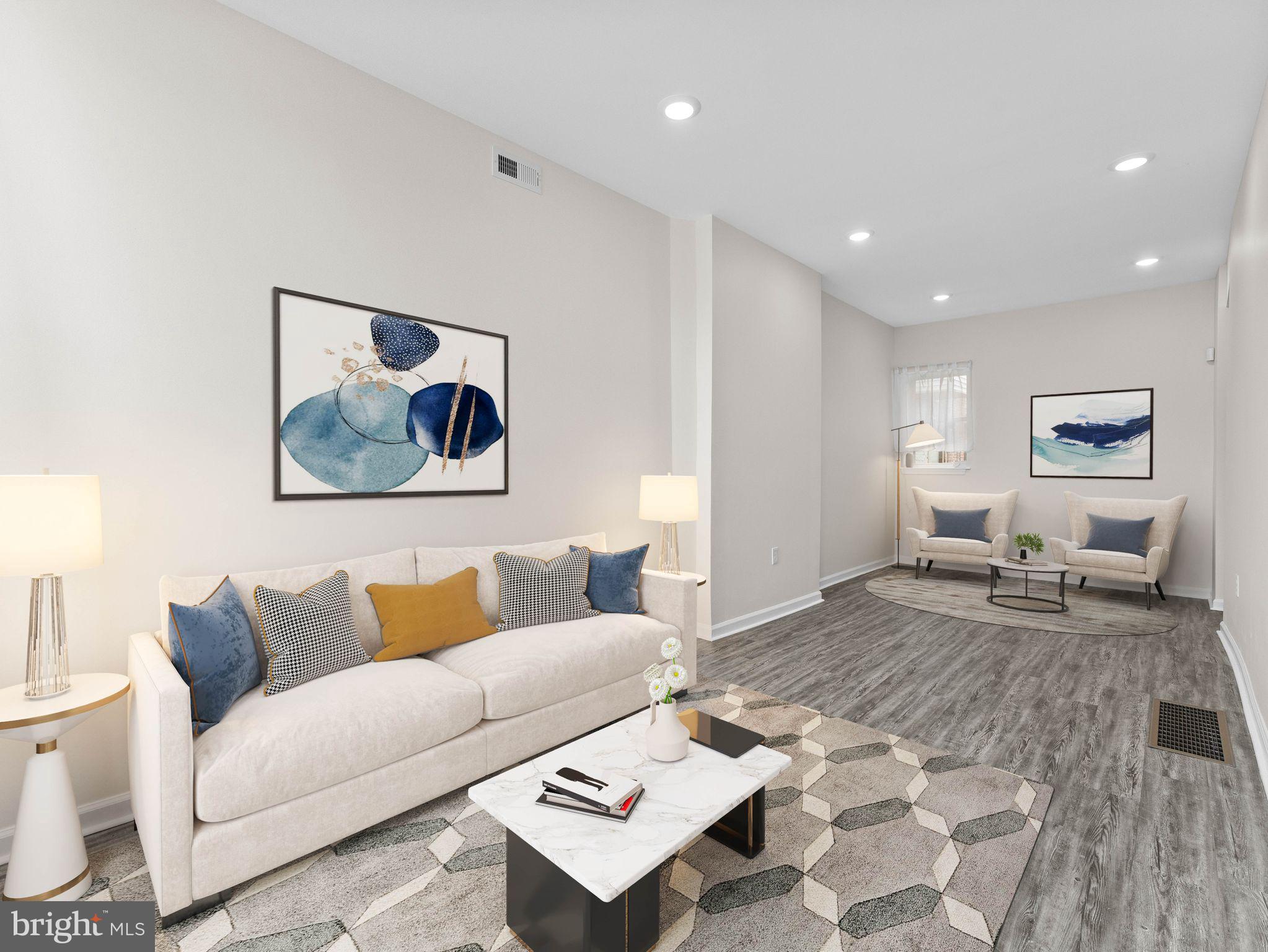 1923 North 20th Street, Unit 2 Philadelphia, PA 19121 - Photo 5 of 50 a living room with furniture and a rug