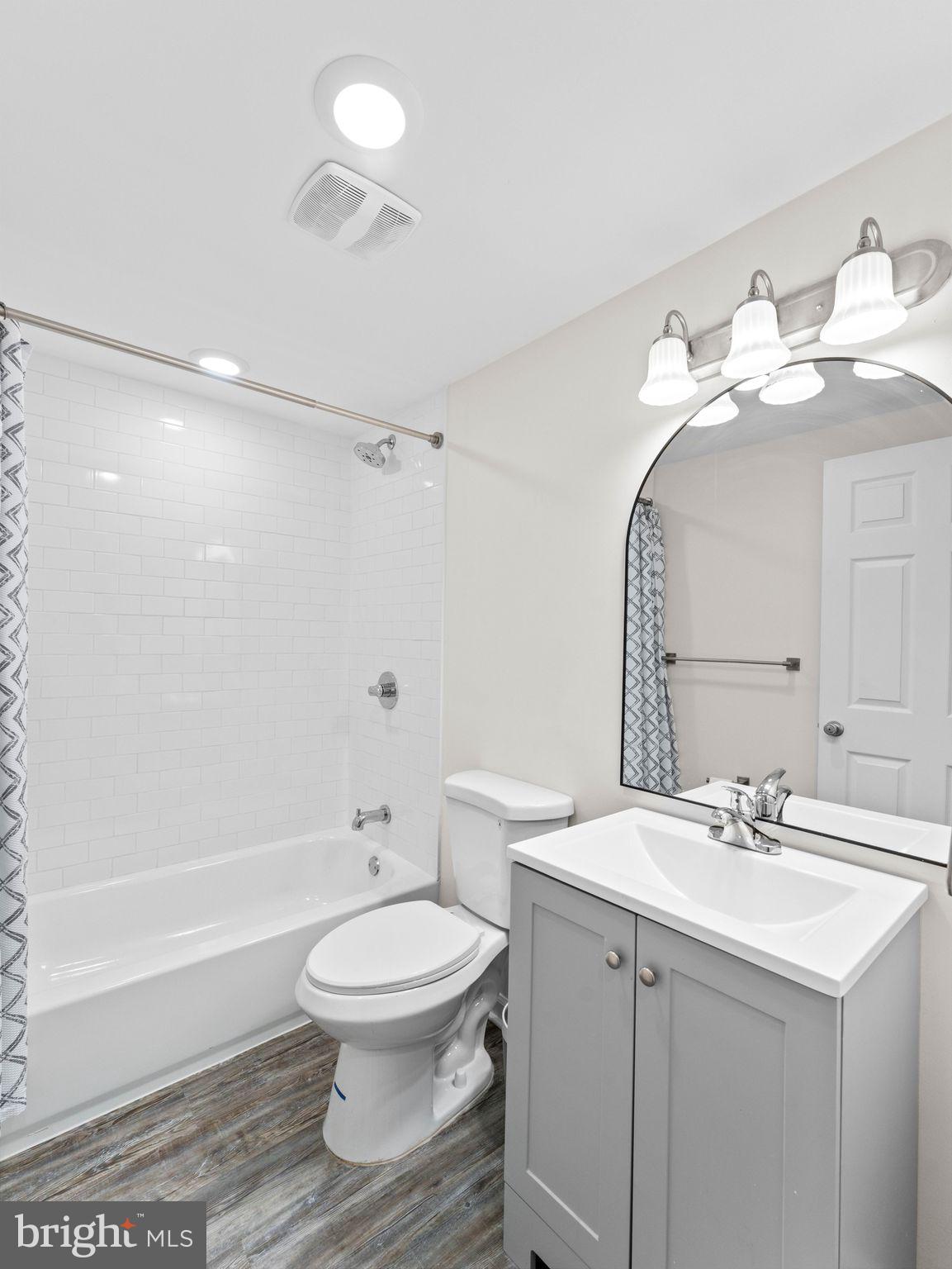 1923 North 20th Street, Unit 2 Philadelphia, PA 19121 - Photo 9 of 50 a bathroom with a sink toilet and shower