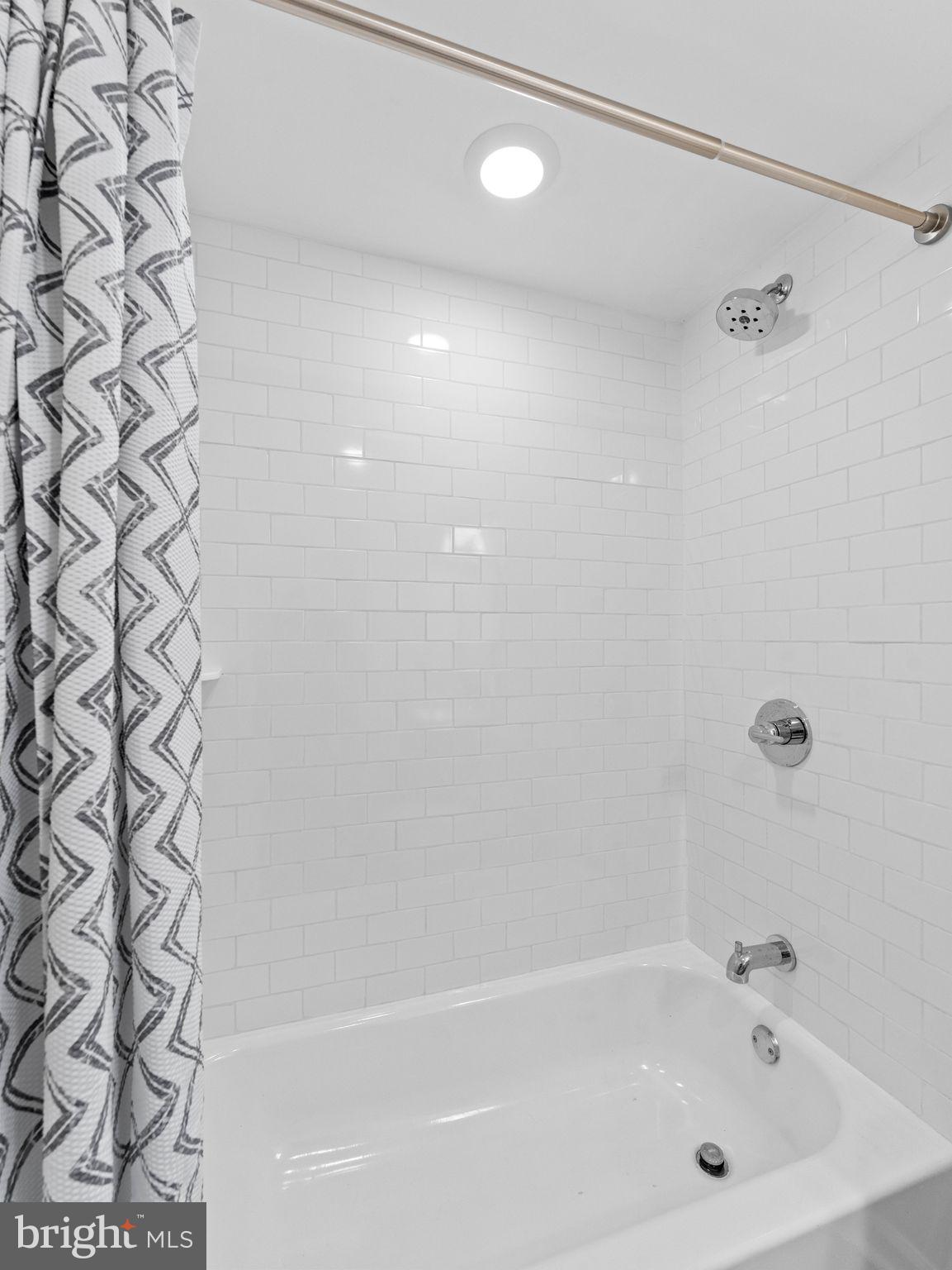 1923 North 20th Street, Unit 2 Philadelphia, PA 19121 - Photo 10 of 50 a bathroom with a bathtub and shower