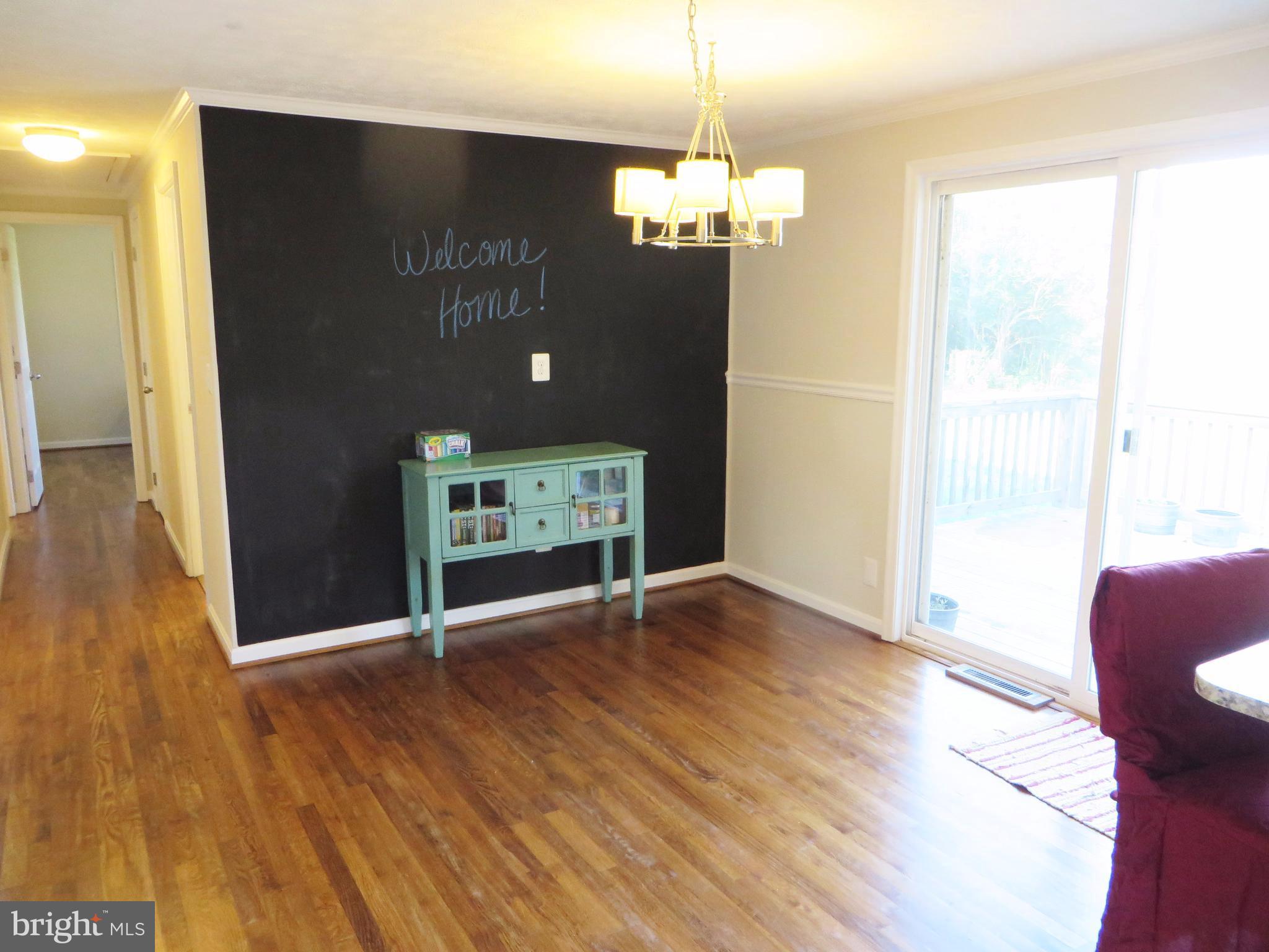 16100 Thomas Road Piney Point, MD 20674 - Photo 6 of 30 Dining area with sliding glass door to deck