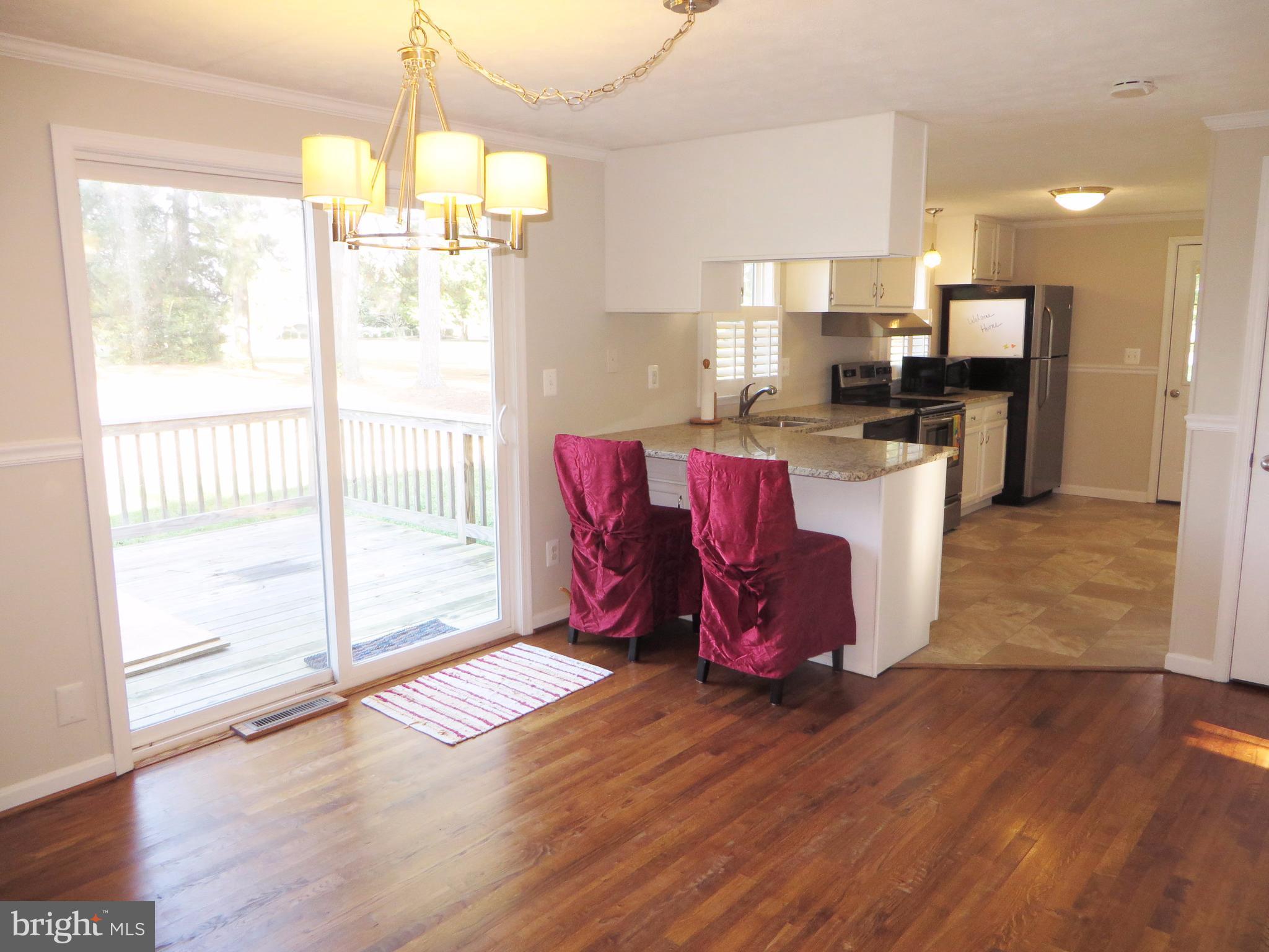 16100 Thomas Road Piney Point, MD 20674 - Photo 9 of 30 Dining area to kitchen
