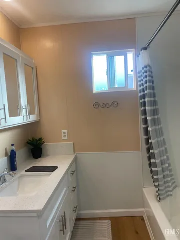 a bathroom with a sink and a bathtub