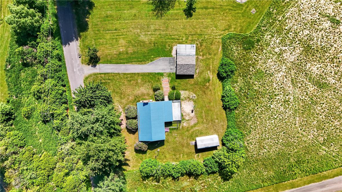 62 Stoney Road Tamaqua, PA 18252 - Photo 58 of 61 An aerial view showcases a residential property nestled amidst lush, verdant landscapes with ample open space.