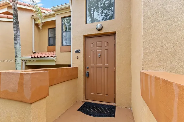 a view of kitchen with cabinets