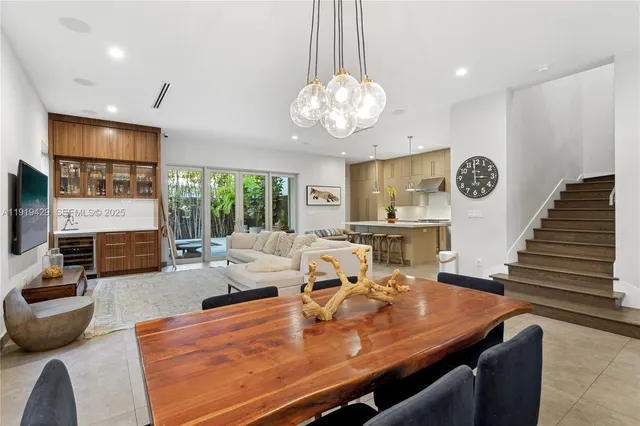 a living room with fireplace furniture and a flat screen tv
