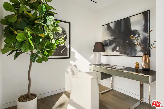 a bathroom with a sink and shower