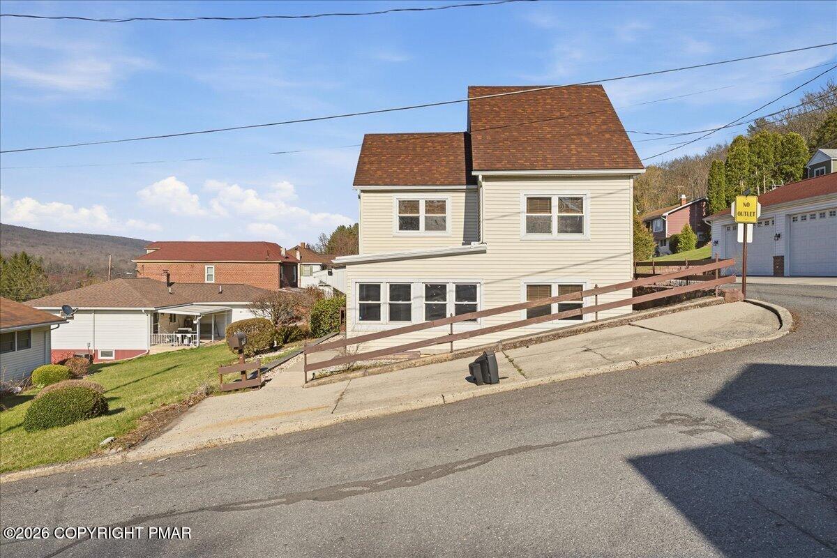 115 Spruce Street Nesquehoning, PA 18240 - Photo 2 of 38 a view of a house with pool and chairs