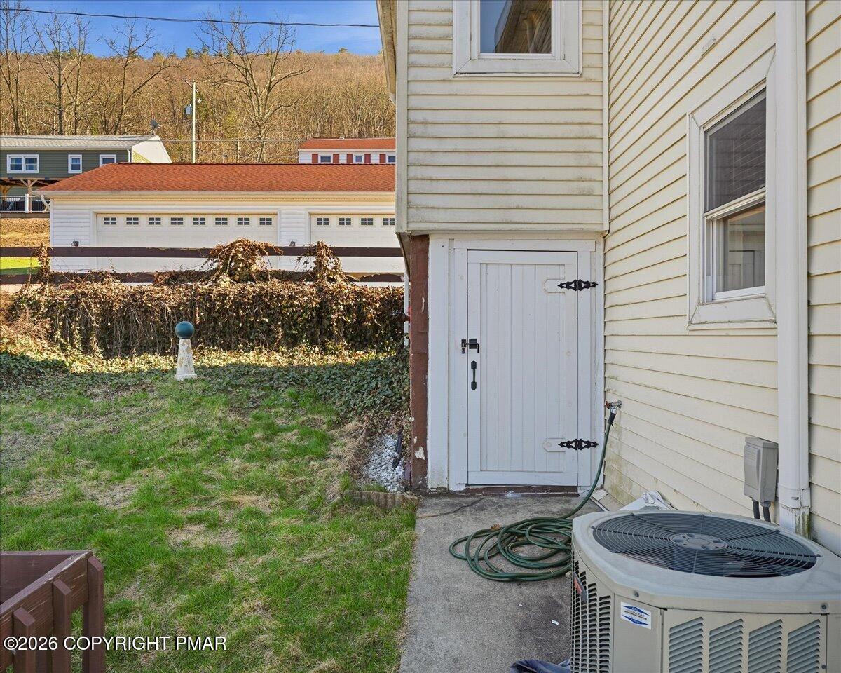 115 Spruce Street Nesquehoning, PA 18240 - Photo 8 of 38 a view of a back yard of the house