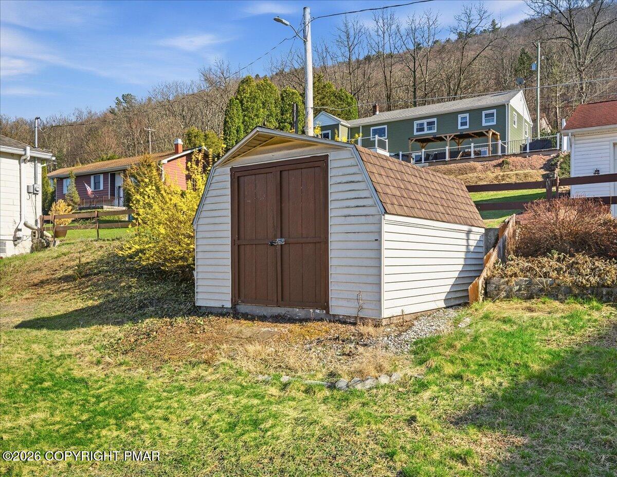 115 Spruce Street Nesquehoning, PA 18240 - Photo 9 of 38 a front view of a house with a yard