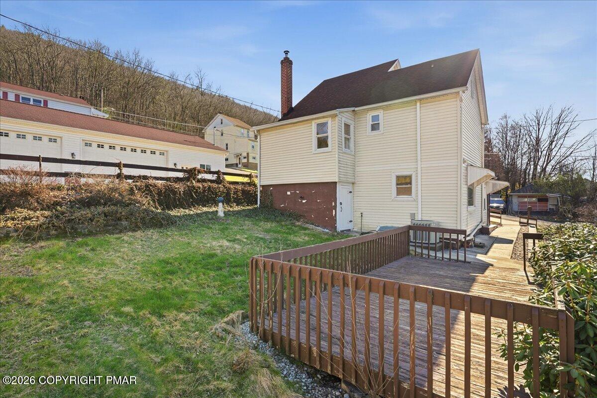 115 Spruce Street Nesquehoning, PA 18240 - Photo 10 of 38 a view of a house with backyard and sitting area
