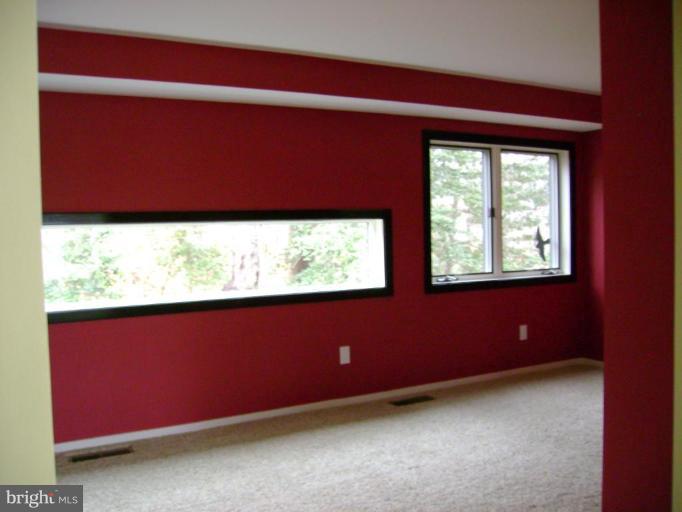 1801 Hatfield Road Huntingtown, MD 20639 - Photo 12 of 19 a view of empty room with window