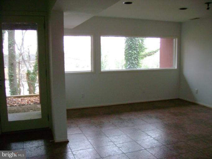 1801 Hatfield Road Huntingtown, MD 20639 - Photo 13 of 19 a view of an empty room with a window