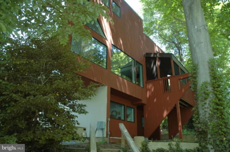 1801 Hatfield Road Huntingtown, MD 20639 - Photo 6 of 19 a view of a house with a tree