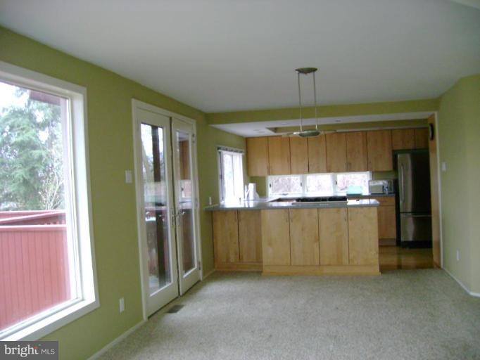 1801 Hatfield Road Huntingtown, MD 20639 - Photo 10 of 19 a view of a kitchen with a dishwasher and a window