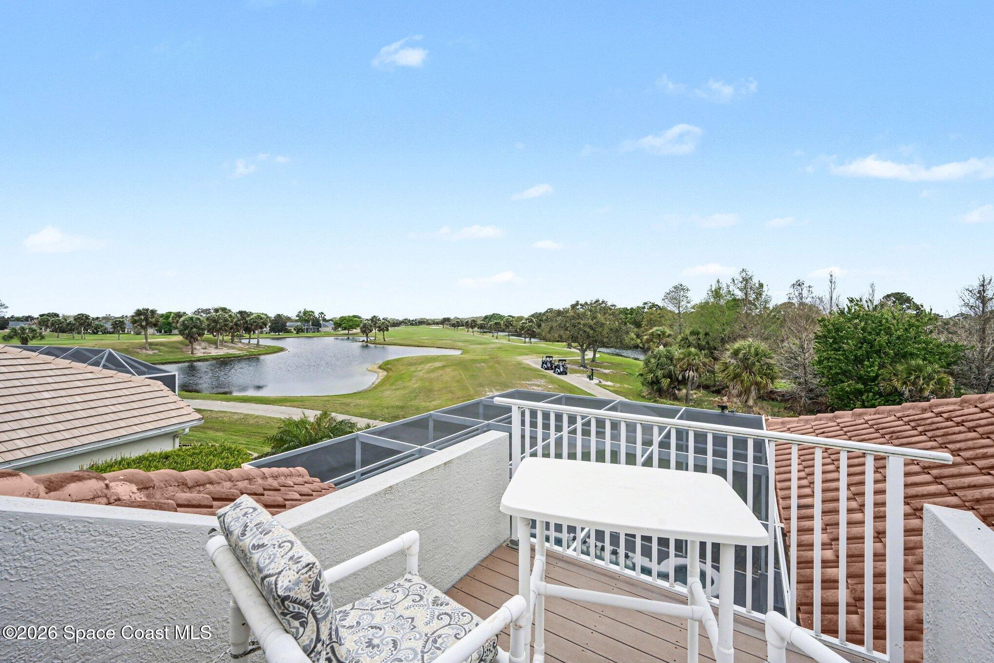 4317 Collingtree Drive Rockledge, FL 32955 - Photo 37 of 64 a view of a balcony with lake view and a floor to ceiling window