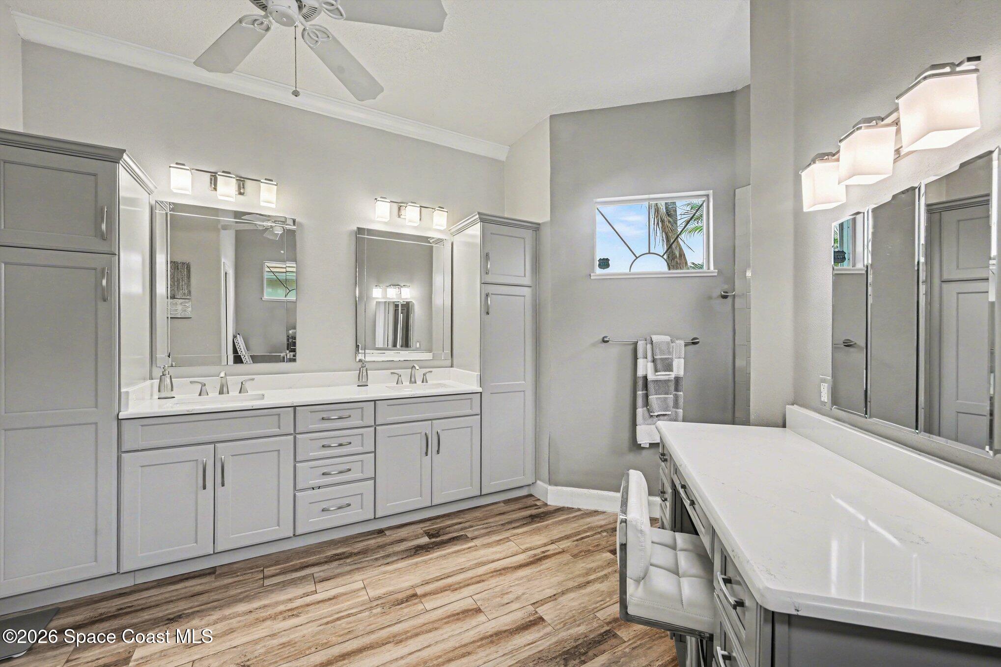 4317 Collingtree Drive Rockledge, FL 32955 - Photo 43 of 64 a spacious bathroom with a granite countertop sink a toilet a mirror and shower