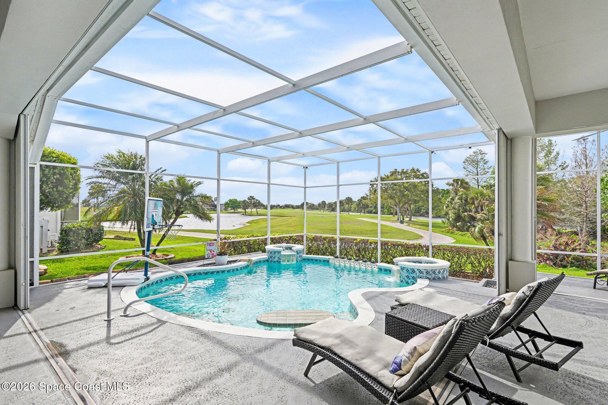 4317 Collingtree Drive Rockledge, FL 32955 - Photo 45 of 64 a view of a swimming pool with a patio