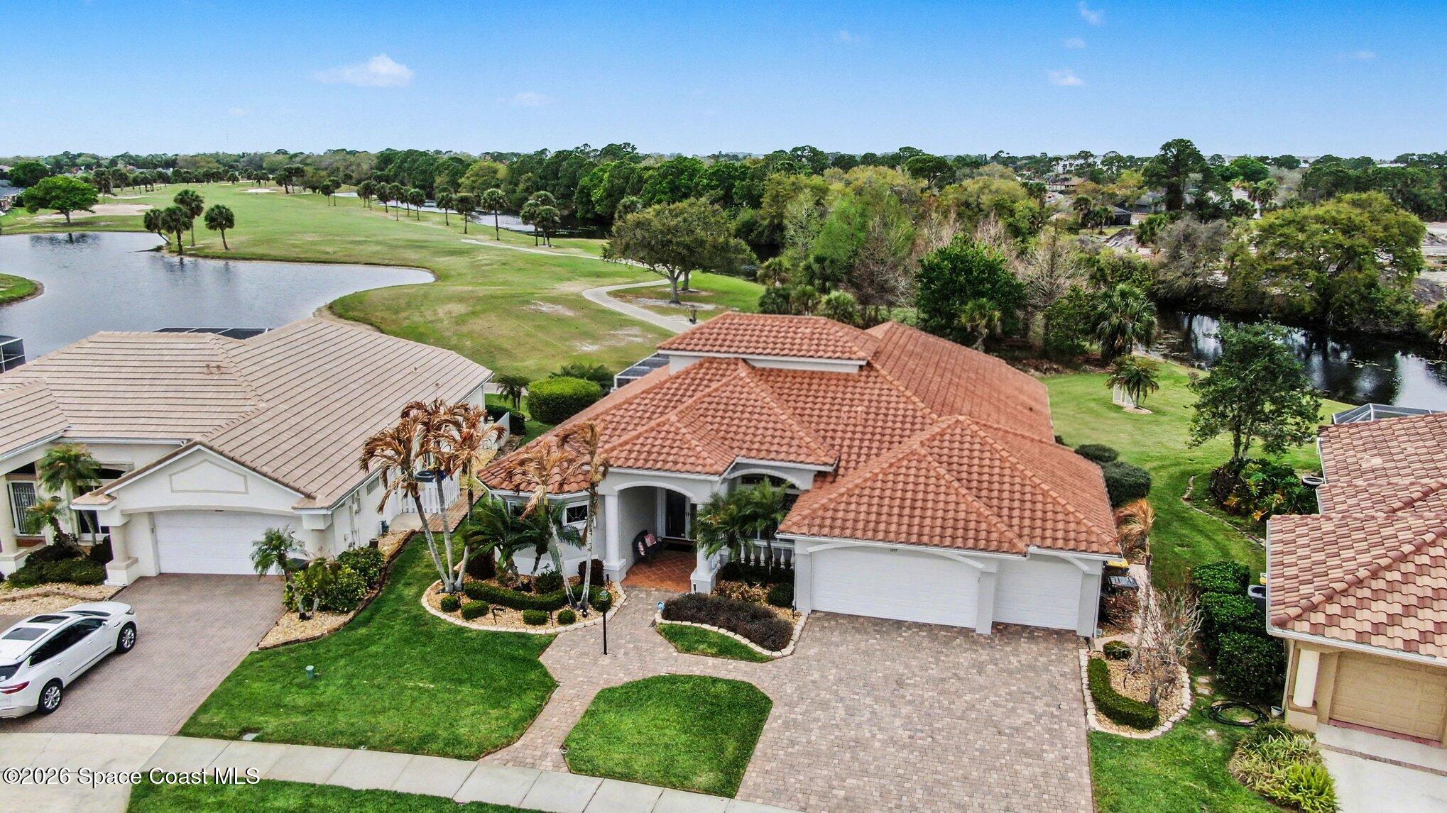 4317 Collingtree Drive Rockledge, FL 32955 - Photo 60 of 64 an aerial view of a house with garden space and street view