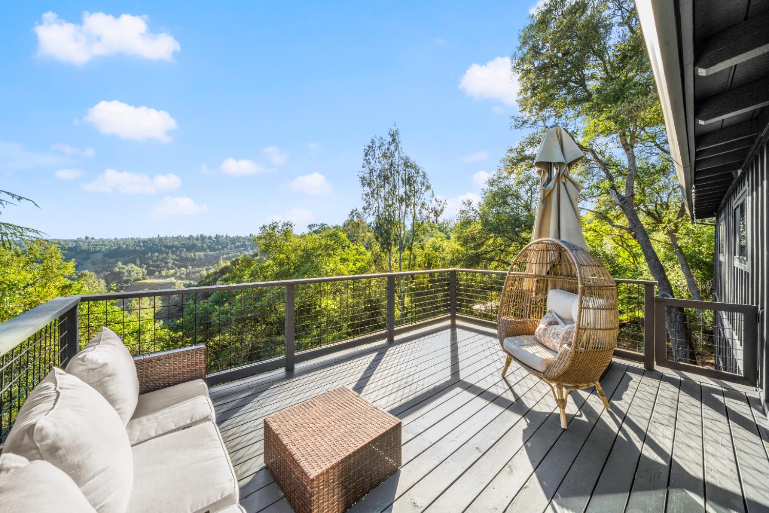 a view of a balcony with chairs