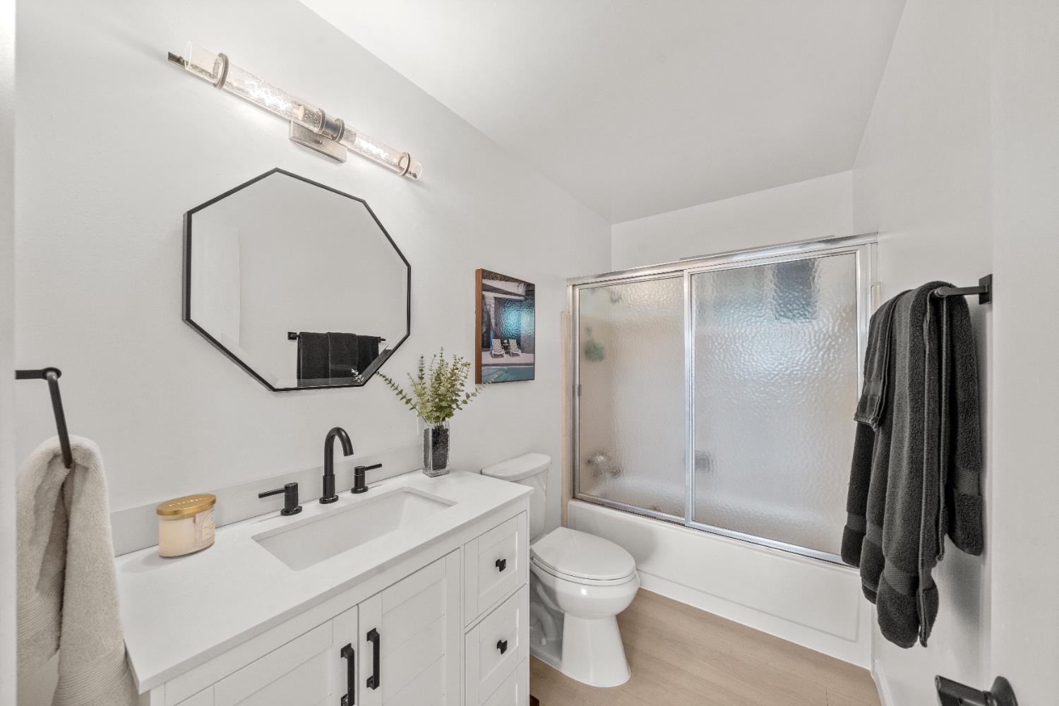 140 Rio Camino Street Auburn, CA 95603 - Photo 27 of 56 a bathroom with a sink toilet and shower