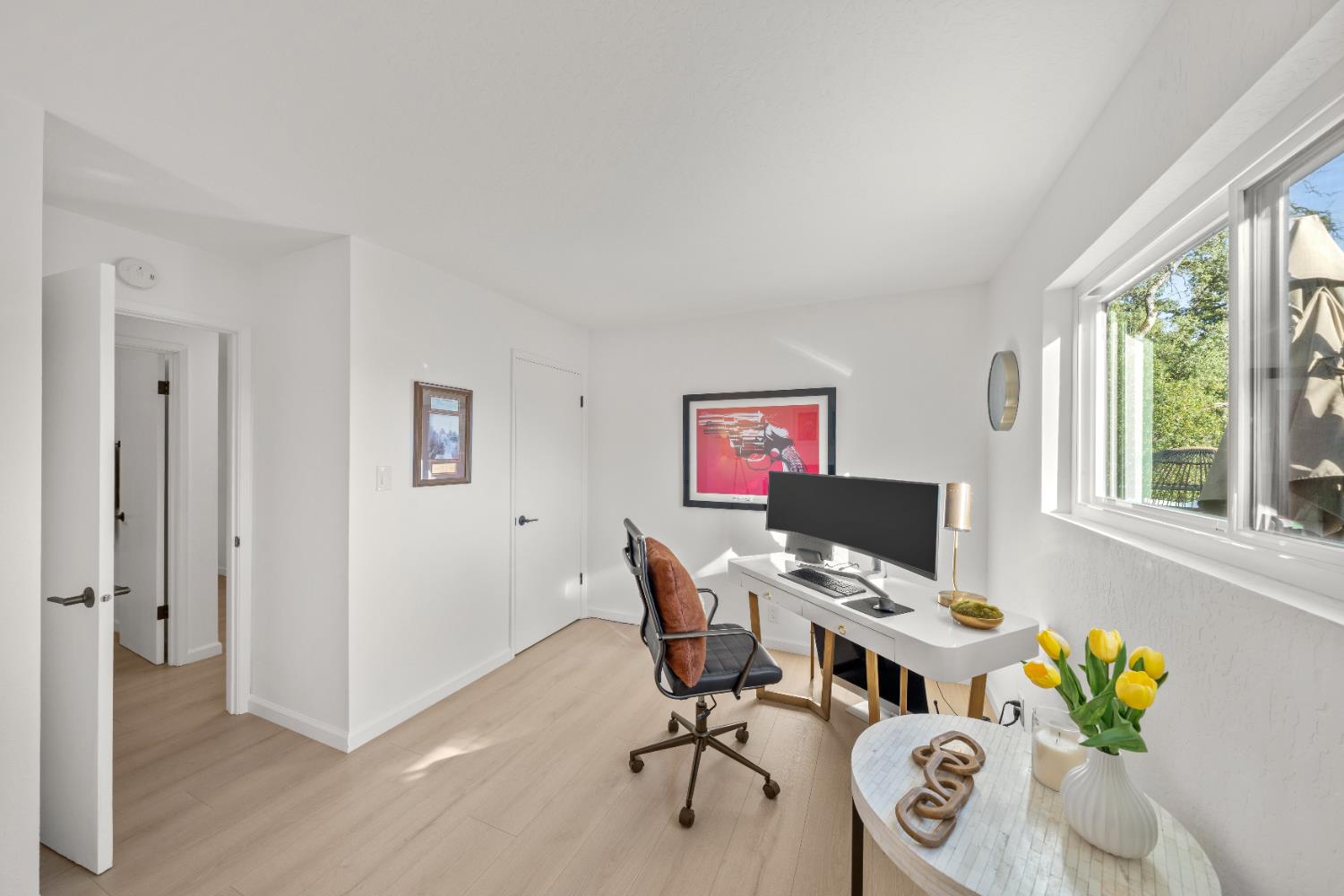 140 Rio Camino Street Auburn, CA 95603 - Photo 31 of 56 a view of a workspace with furniture and a window
