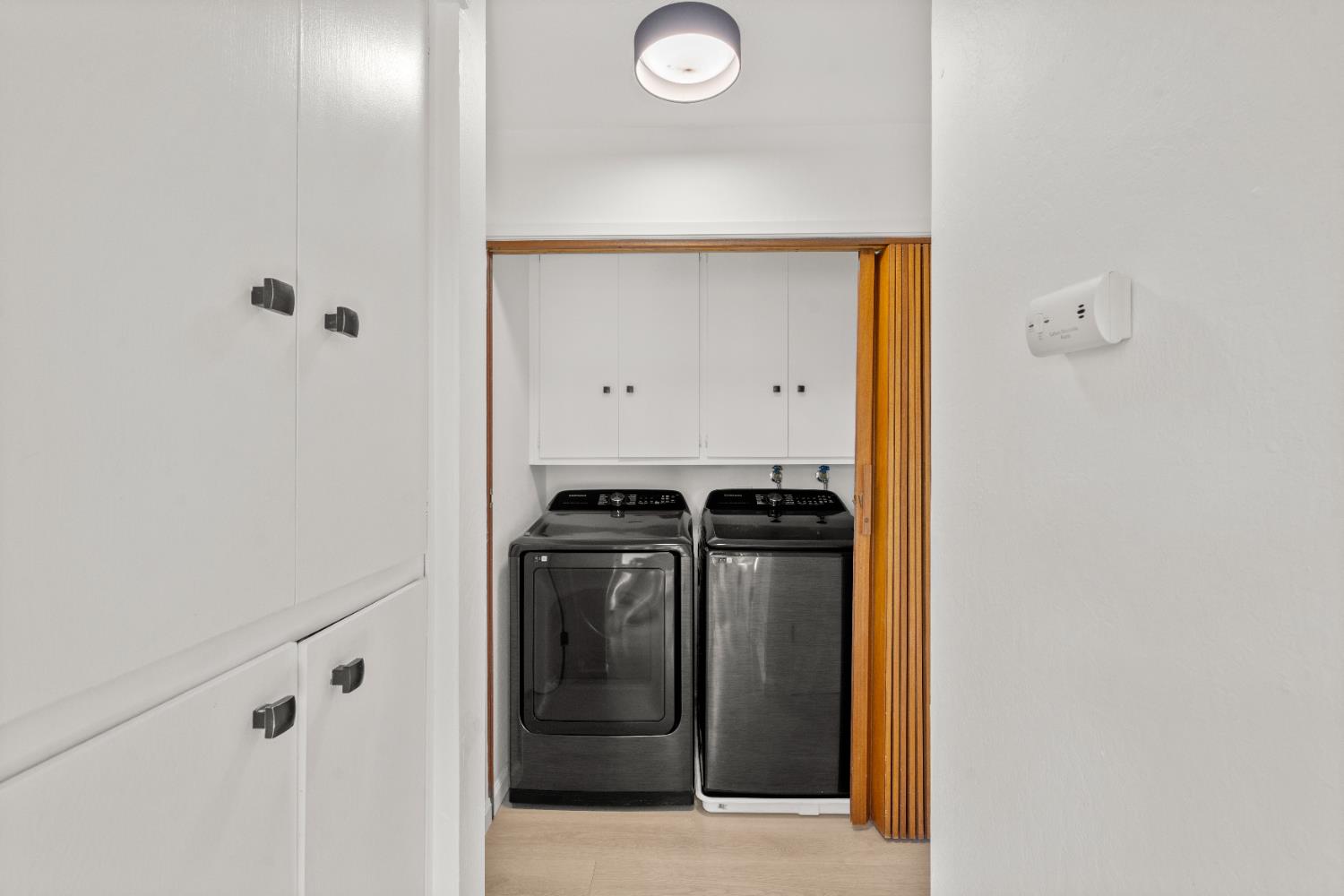 140 Rio Camino Street Auburn, CA 95603 - Photo 33 of 56 a view of a utility room with washer and dryer