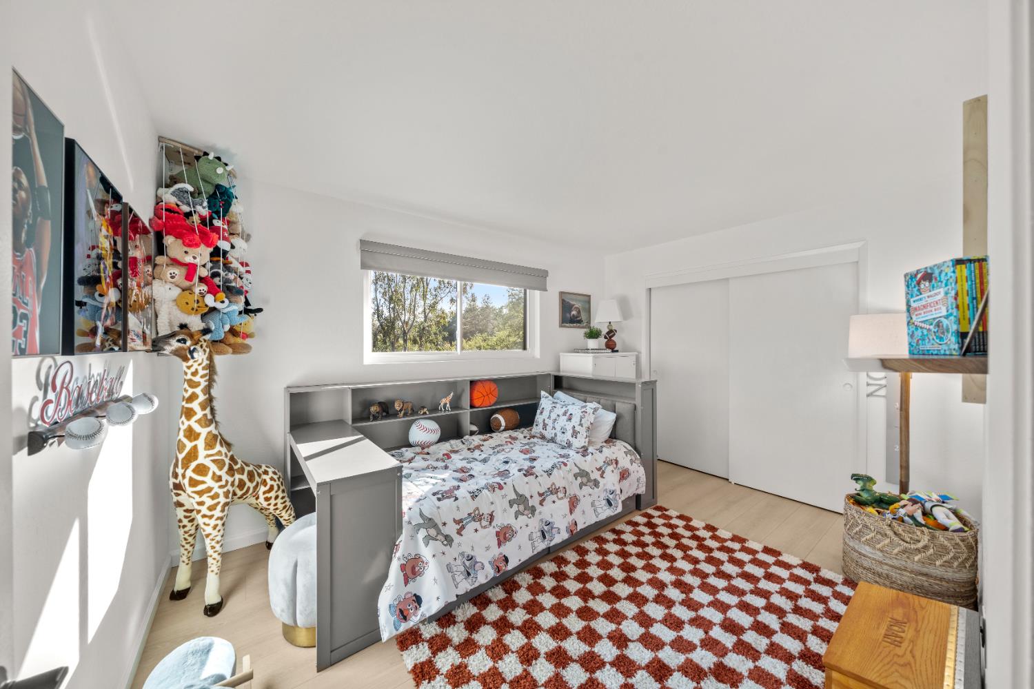 140 Rio Camino Street Auburn, CA 95603 - Photo 34 of 56 a bedroom with furniture and a book shelf