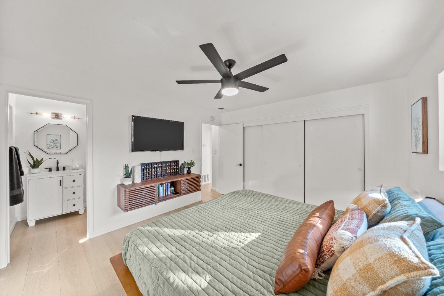 140 Rio Camino Street Auburn, CA 95603 - Photo 38 of 56 a bedroom with a bed and a flat screen tv