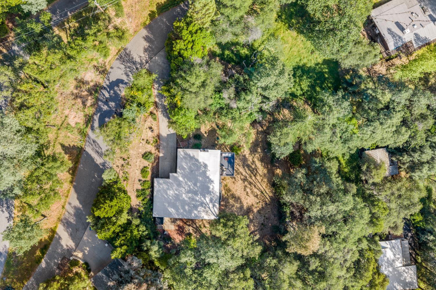140 Rio Camino Street Auburn, CA 95603 - Photo 51 of 56 an aerial view of a house with a yard