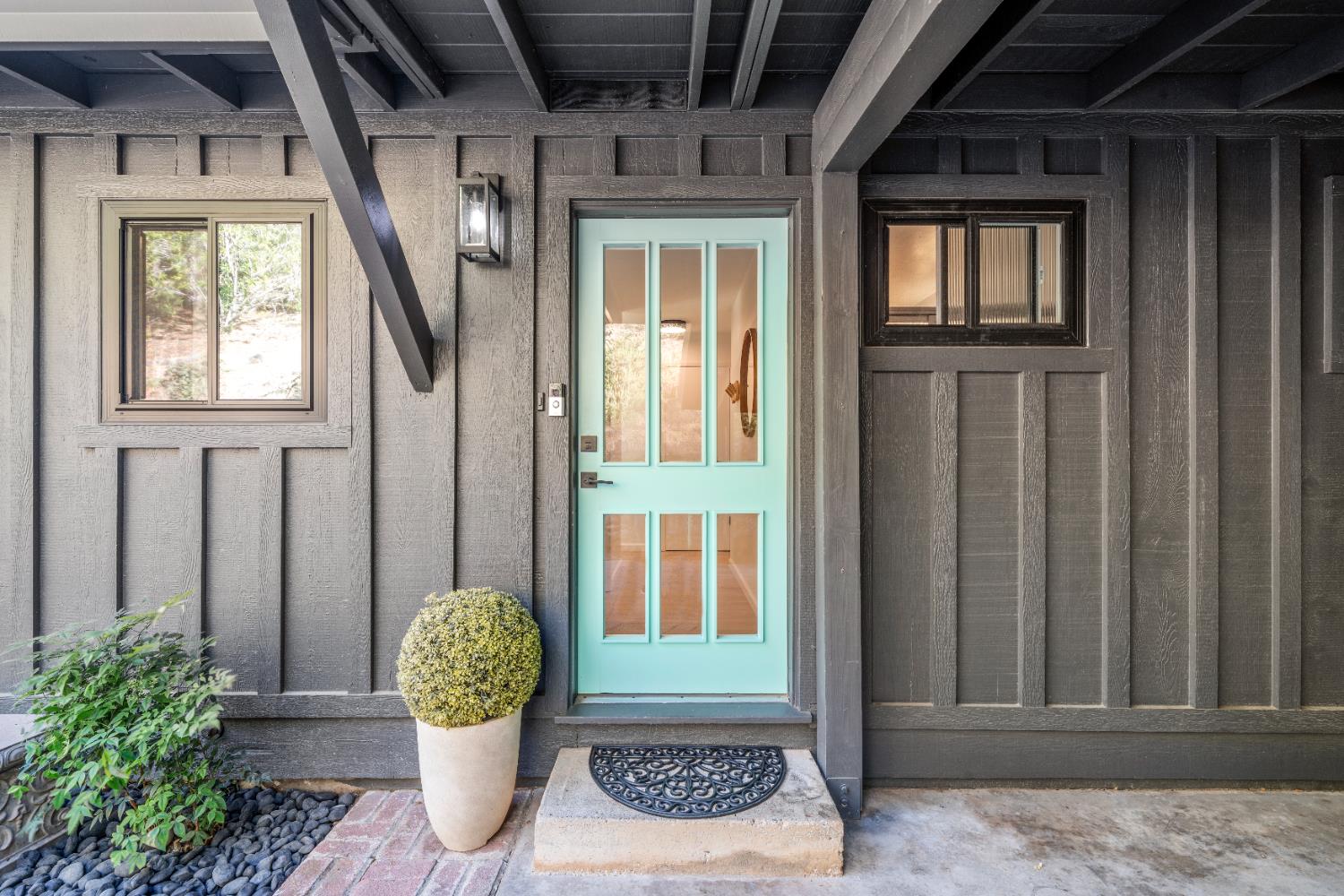 140 Rio Camino Street Auburn, CA 95603 - Photo 7 of 56 a view of an entryway door front of house